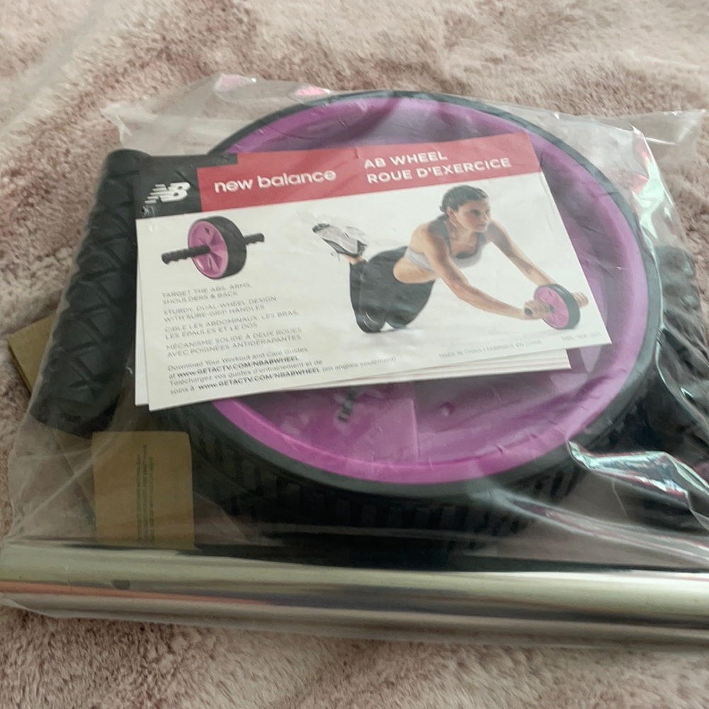 New in  original packaging New Balance exercise wheel